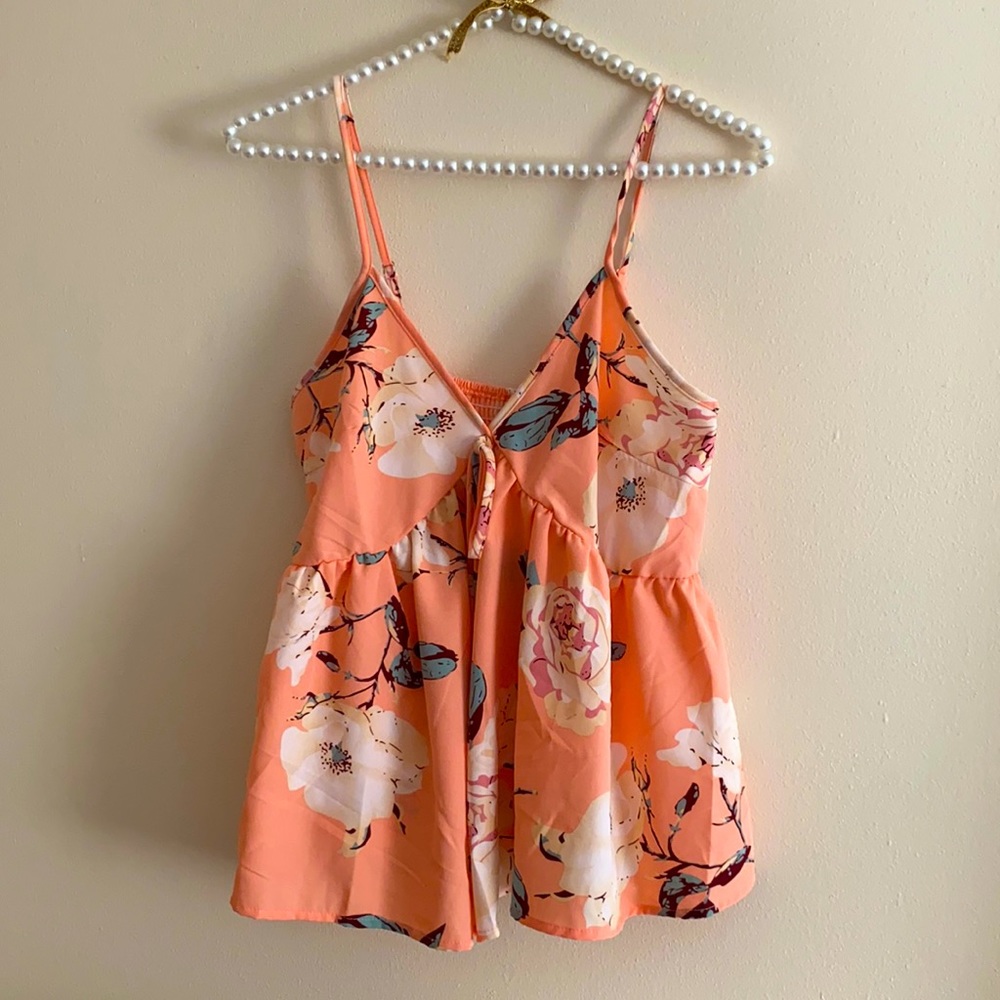 . Size small babydoll style peach floral top!